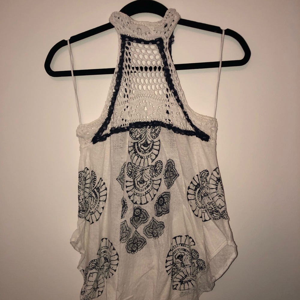 White and navy top